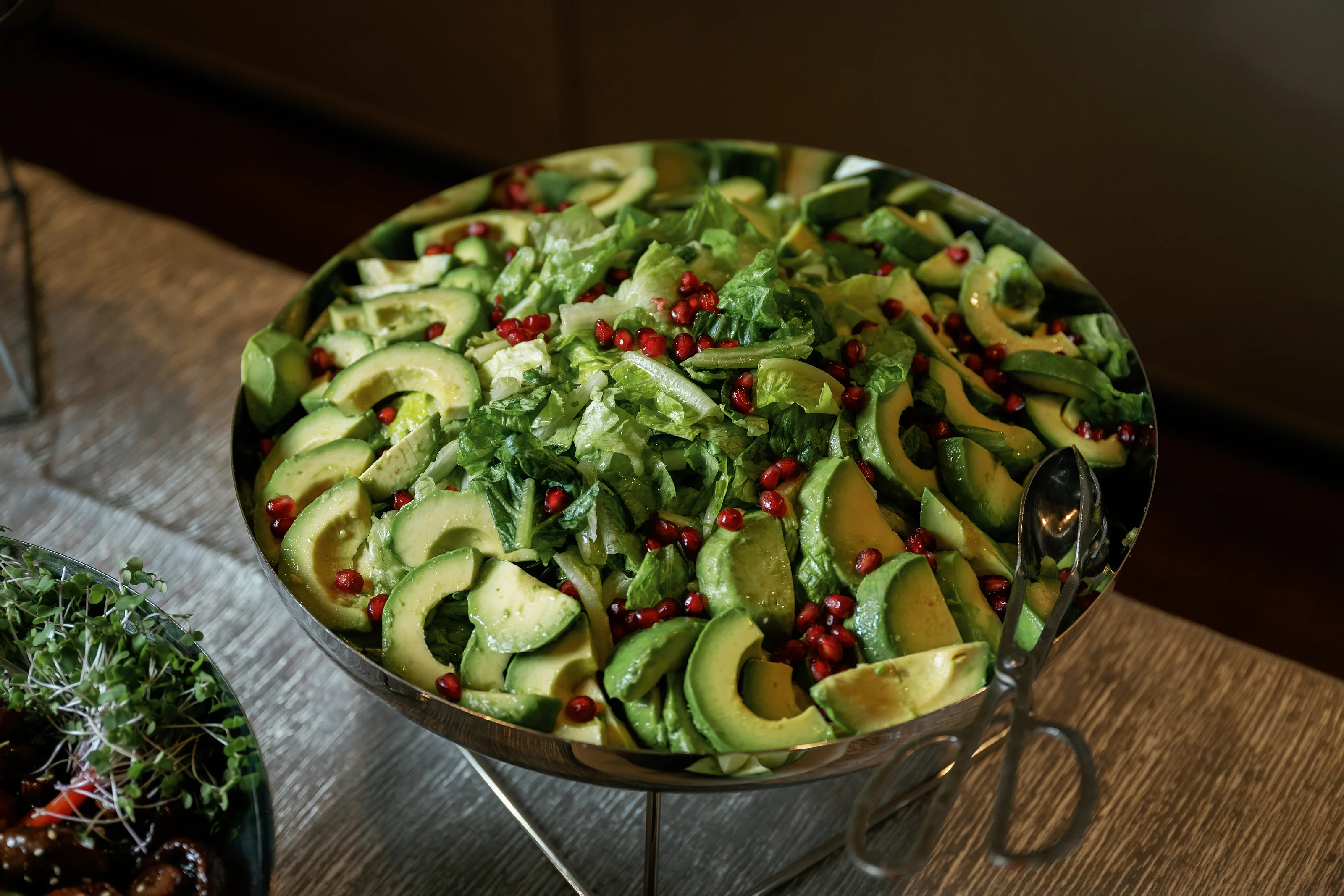 Avocado and cucumber salad with herb garnish