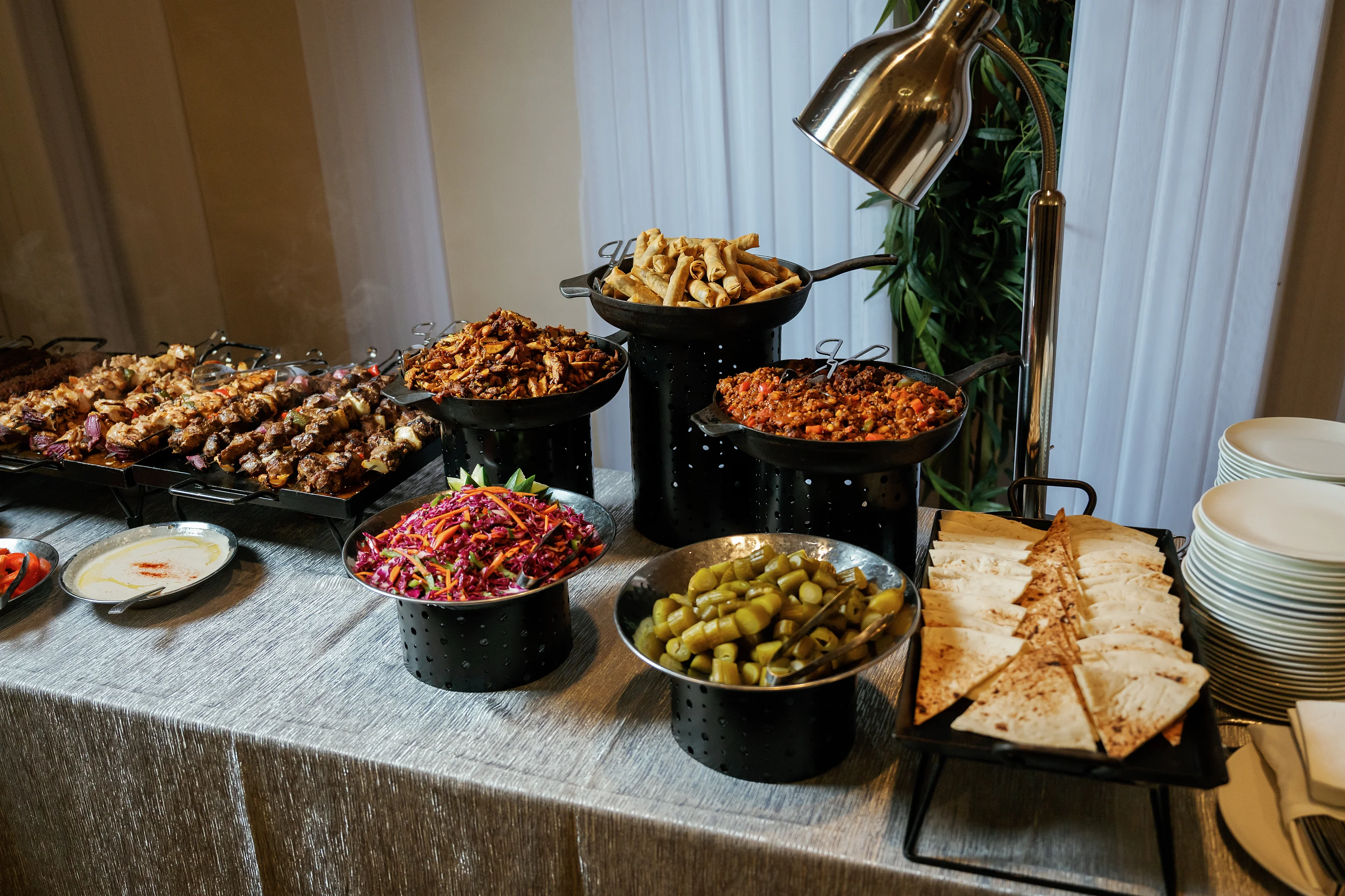 Salads and garnishes on a catering buffet