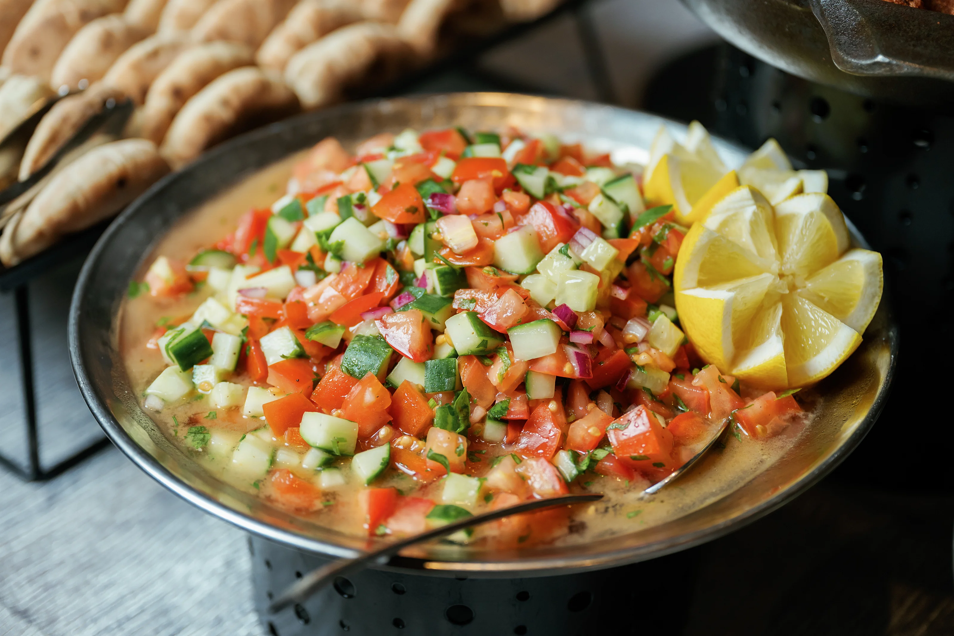 Fresh chopped salad with lemon garnish
