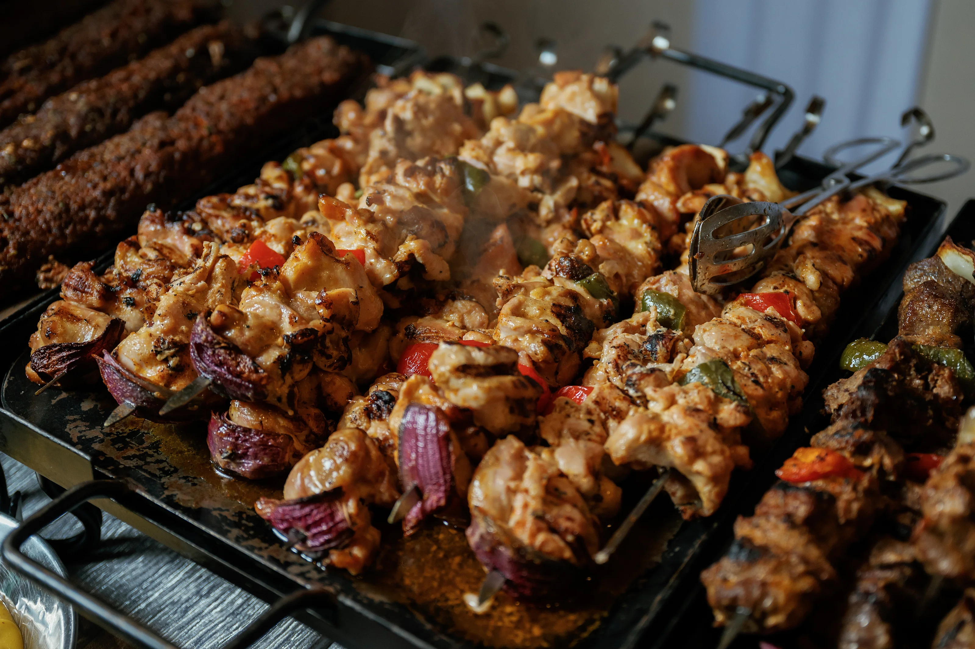 Grilled skewers on a buffet platter
