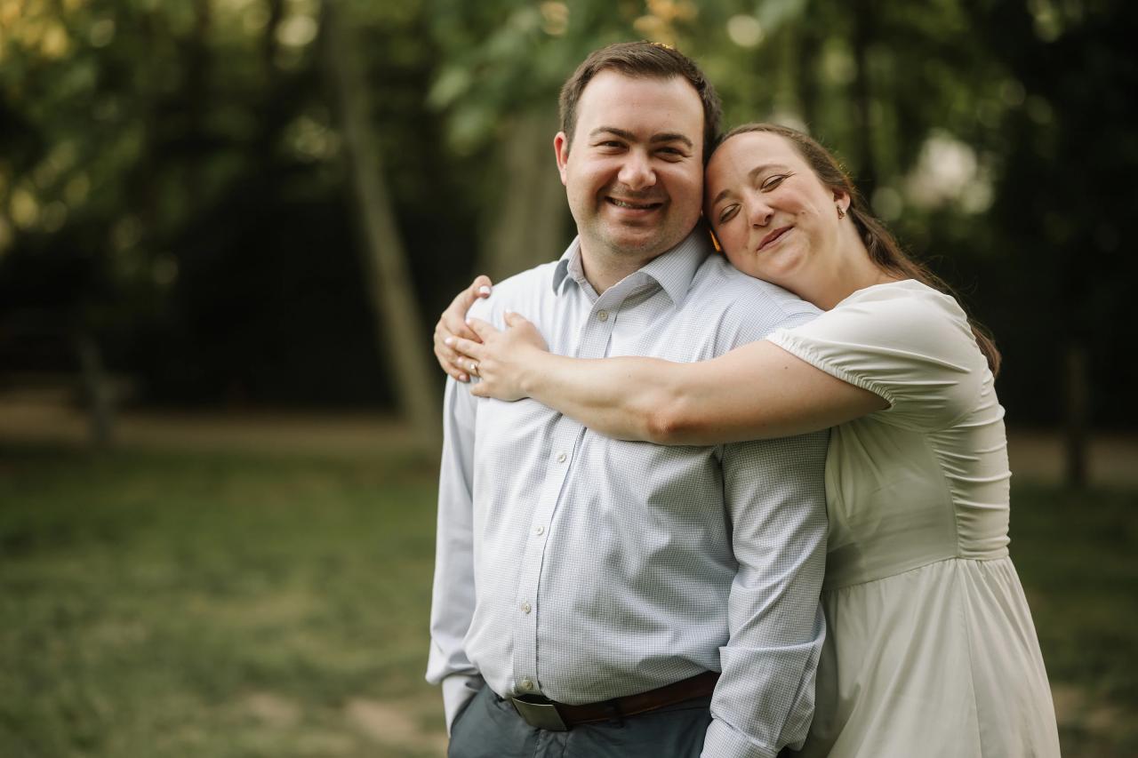 Woman embracing her partner during an outdoor engagement shoot