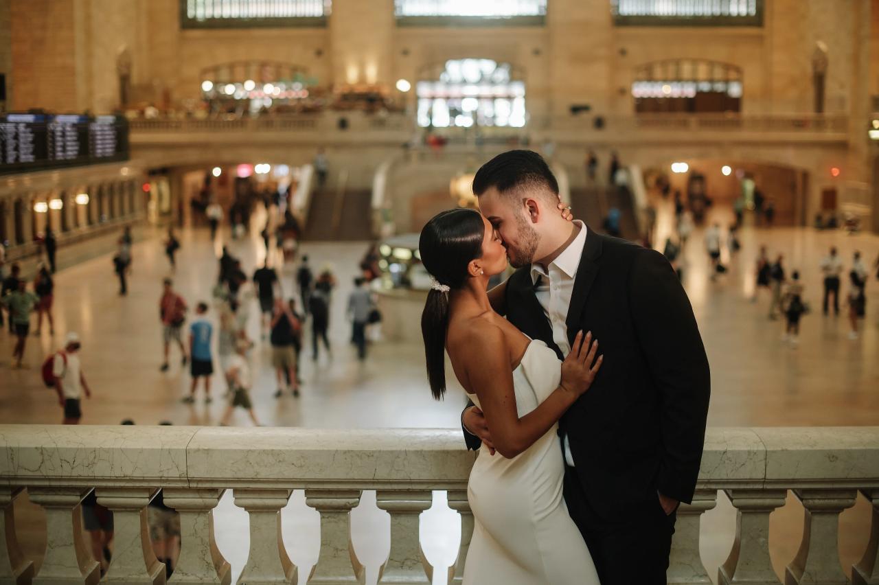 Couple sharing a kiss above the Grand Central concourse