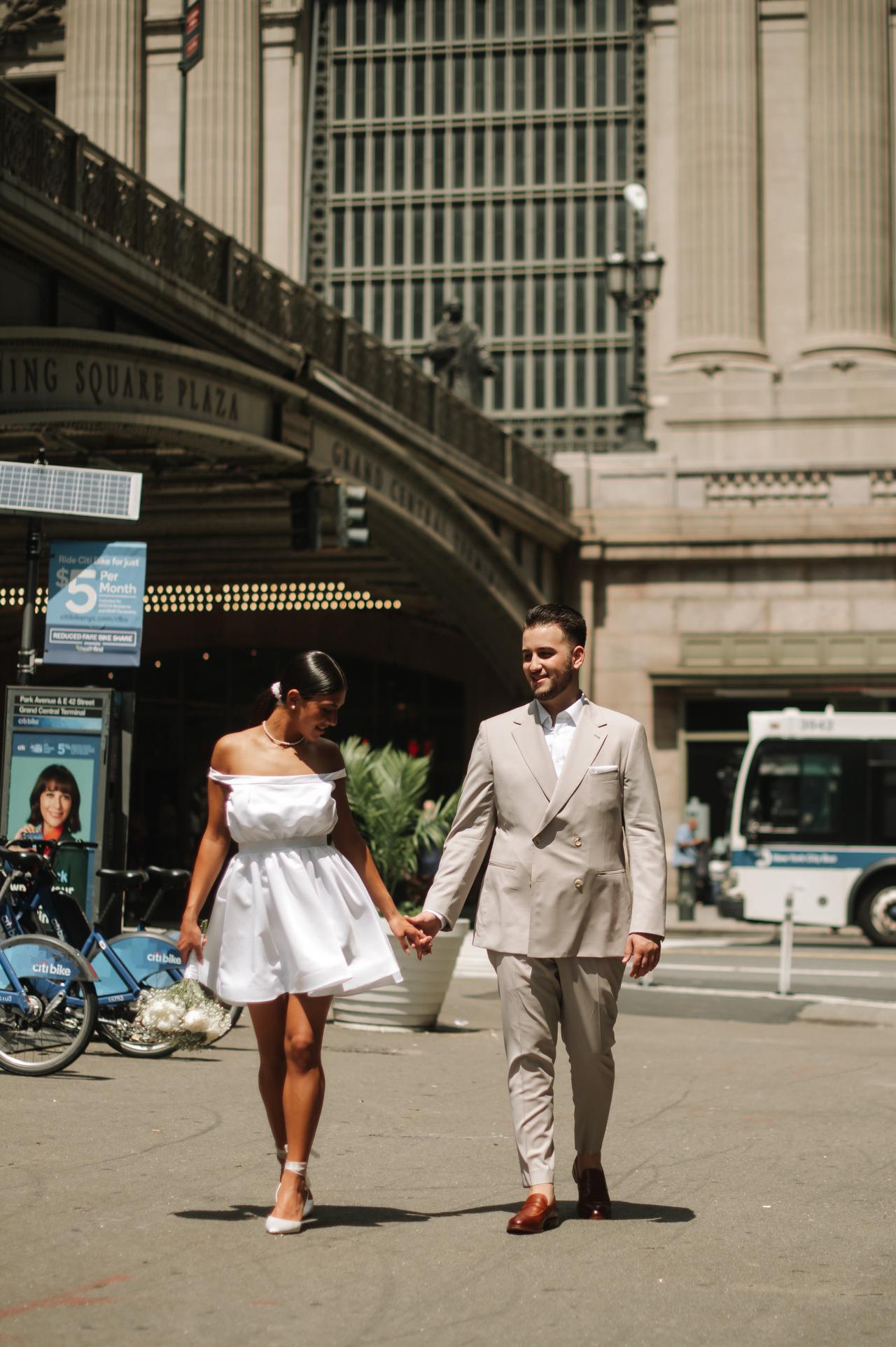 Couple walking together in front of Grand Central Terminal