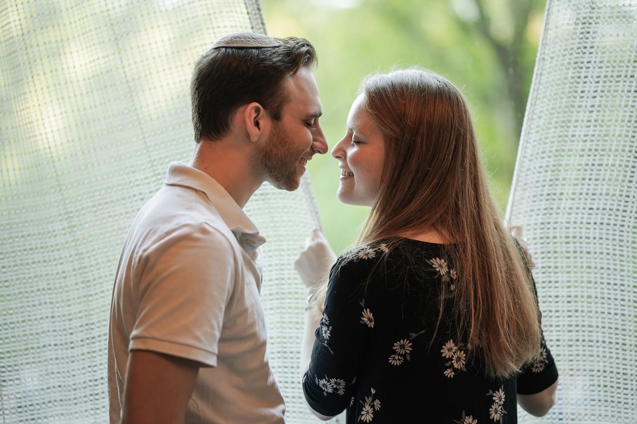 Close engagement portrait in soft window light