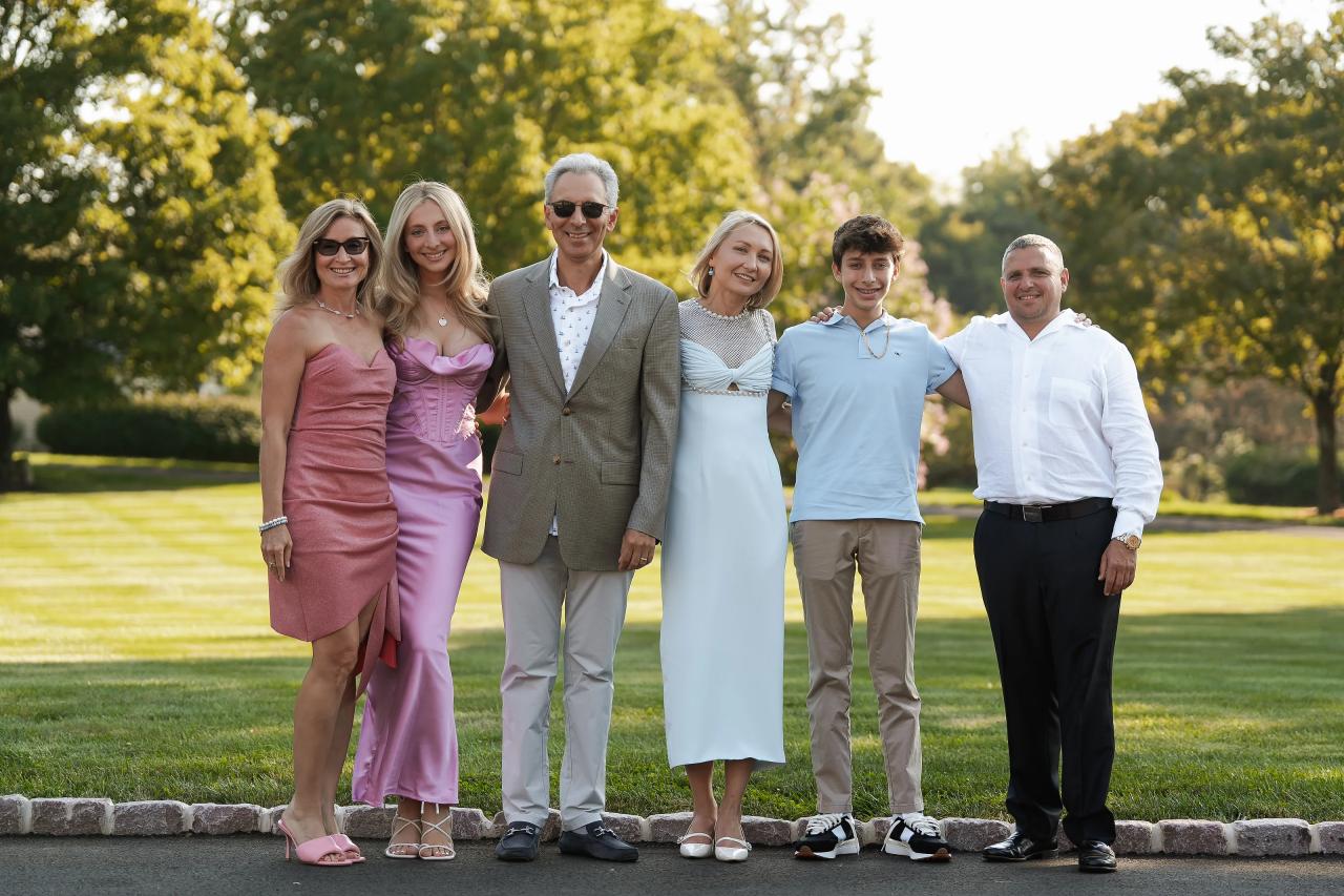 Family group portrait outdoors before the bat mitzvah celebration