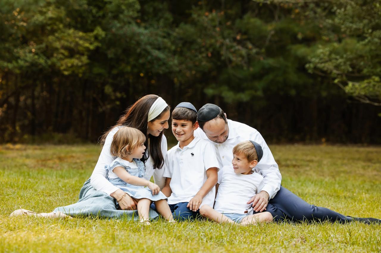 Parents looking toward their children during a candid family portrait