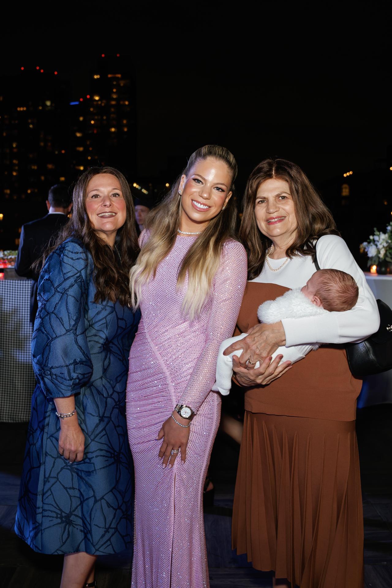Family members smiling together during the Pidyon Haben celebration