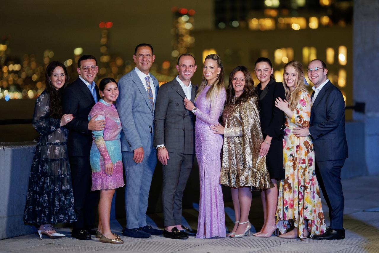 Extended family gathered together for a portrait during the Pidyon Haben celebration