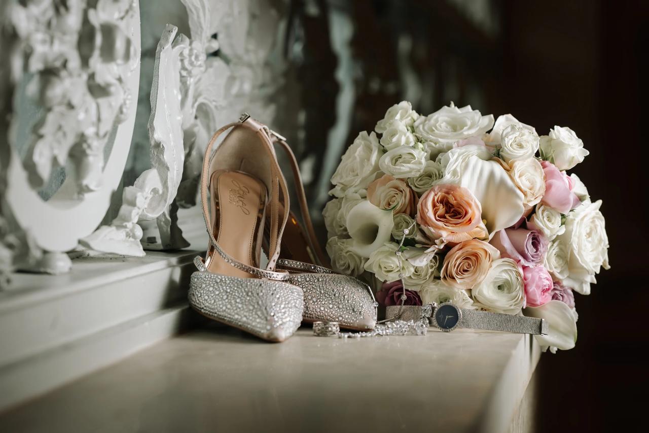Bridal shoes and blush bouquet arranged with wedding details. Jewish wedding in Detroit.