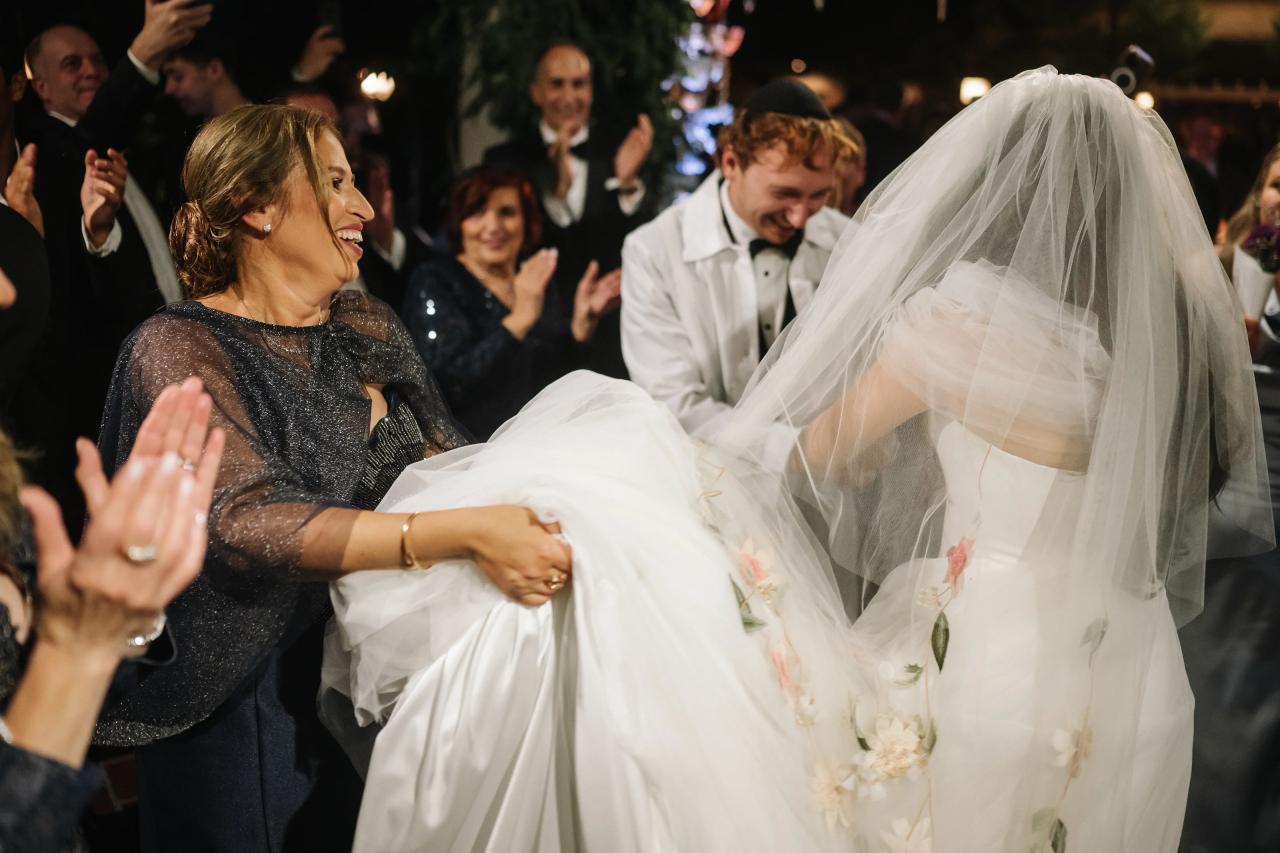 Family celebrating immediately after the wedding ceremony. Crest Hollow wedding in Woodbury, Long Island.