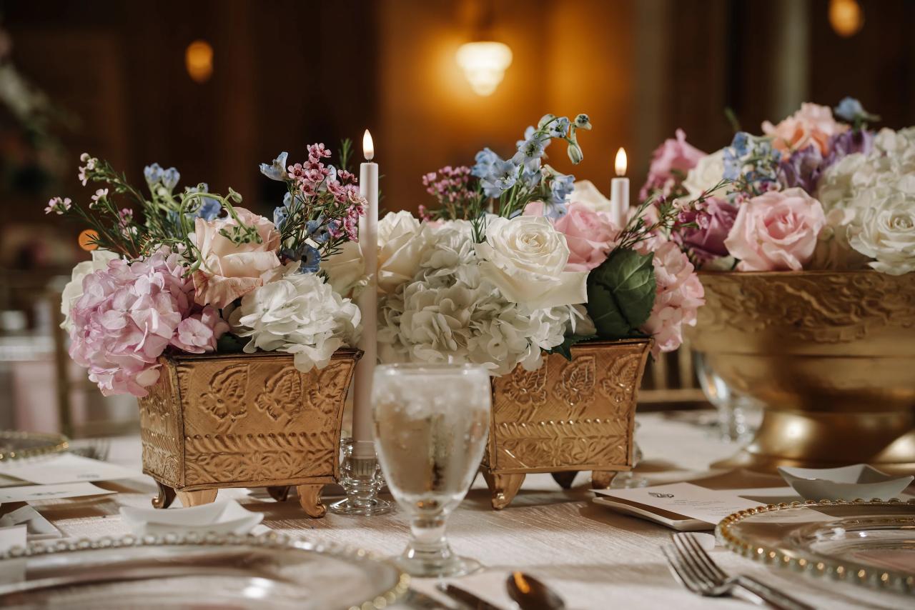 Blush floral centerpiece on a wedding reception table. Jewish wedding in Detroit.