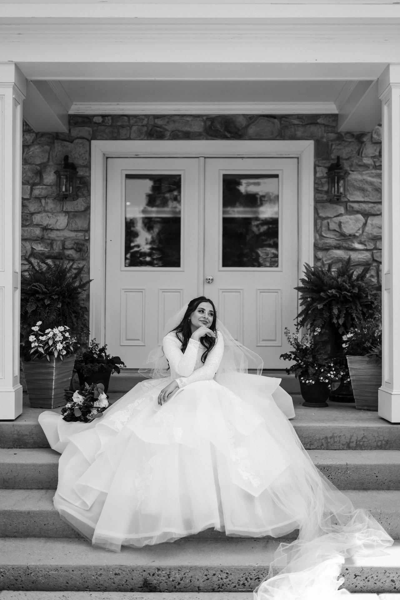 Black and white bridal portrait on the front steps. Jewish wedding in Baltimore.