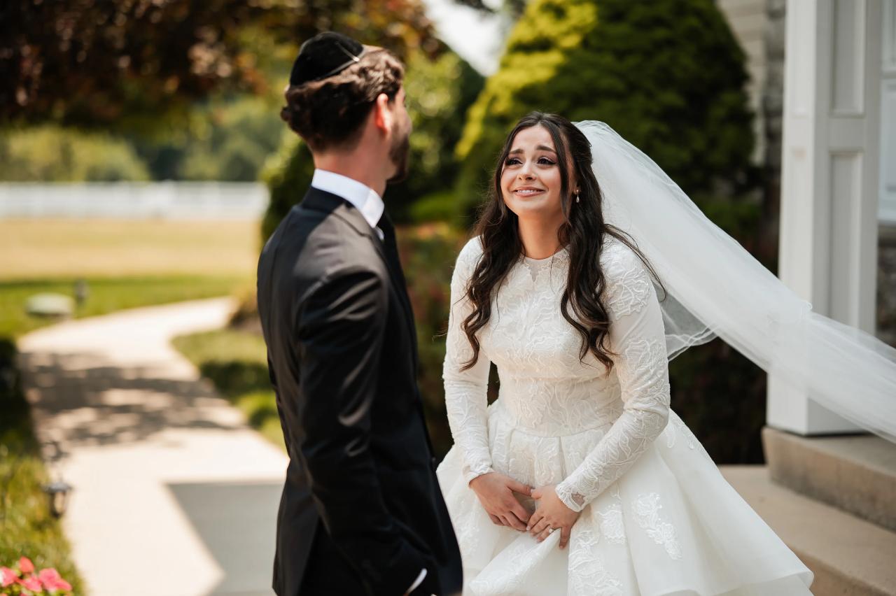 Bride approaching the groom for their first look. Jewish wedding in Baltimore.