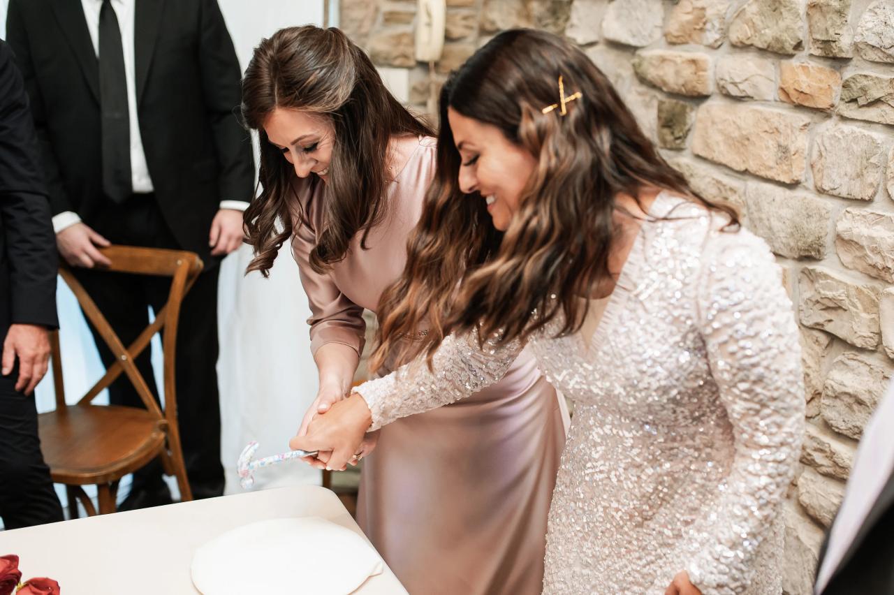 Women signing the ketubah before the Jewish wedding. Jewish wedding in Baltimore.