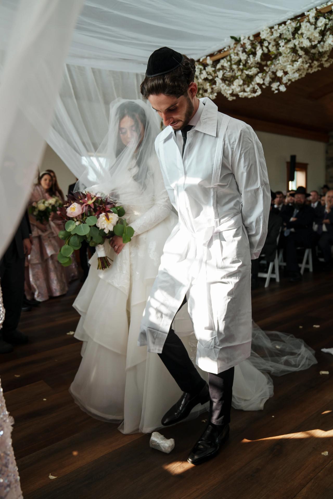 Groom breaking the glass at the Jewish wedding. Jewish wedding in Baltimore.