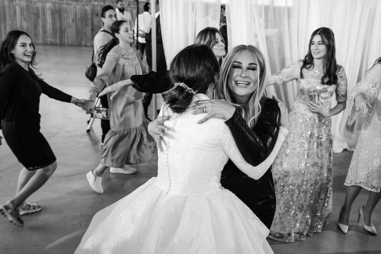Black and white portrait of the bride enjoying the wedding dancing. Jewish wedding in Baltimore.