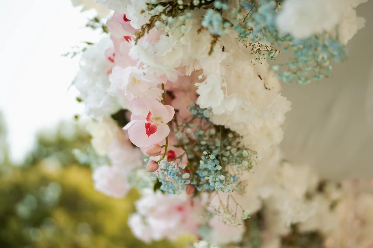 Soft pink and white flowers decorating the wedding chuppah. Wedding at Indian Ridge.