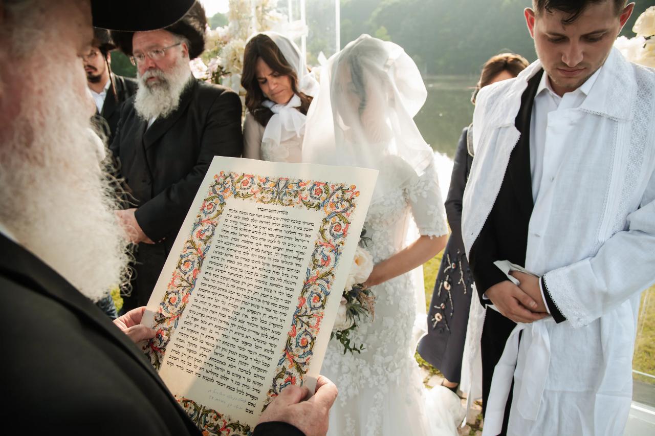 Ketubah presented beneath the wedding chuppah. Wedding at Indian Ridge.
