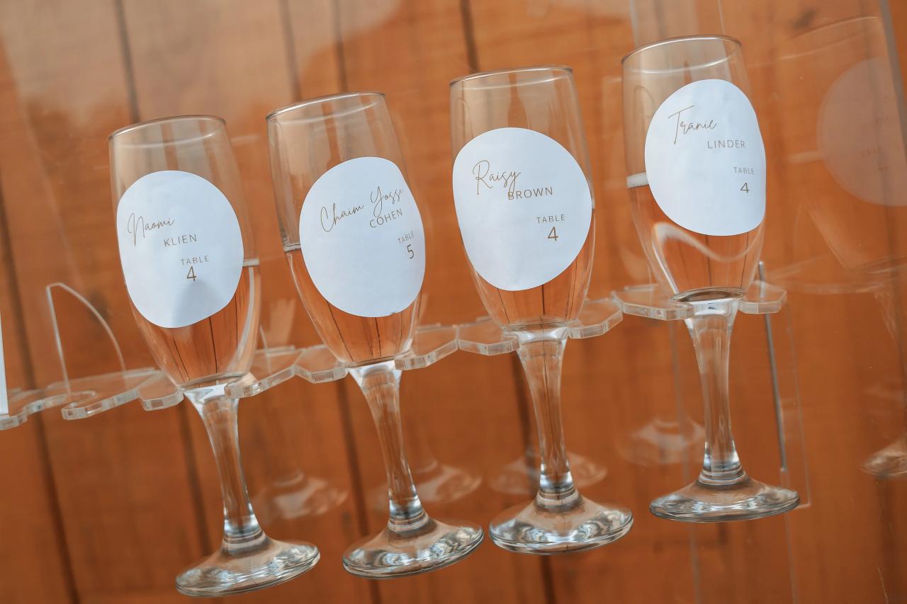 Personalized wedding glasses arranged for the reception. Wedding at Indian Ridge.