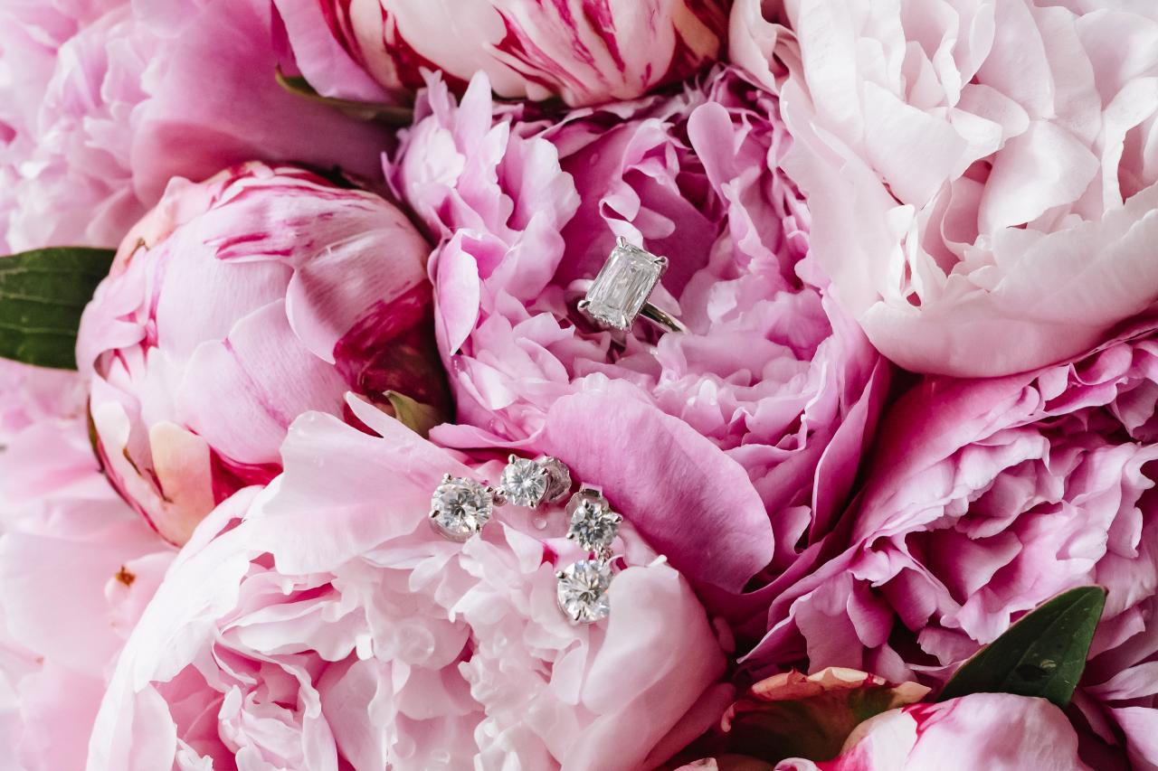 From this Brightstone Hall wedding: wedding rings nestled in a pink peony bouquet. Wedding photography.