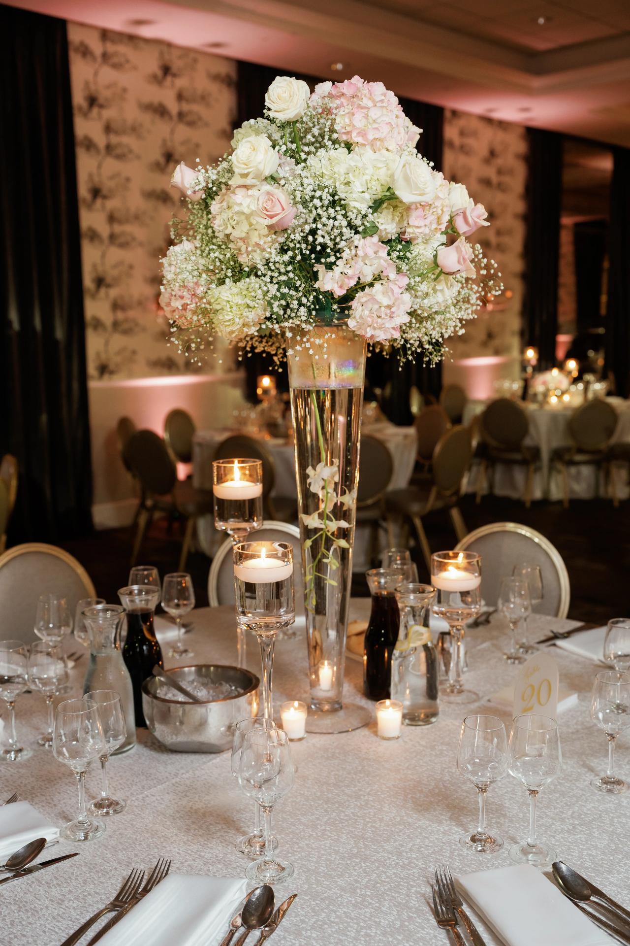 Candlelit flowers and reception table details. Wedding photography at Brightstone, Passaic, NJ.