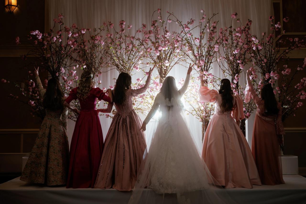 Bridal party in dramatic backlight with veil. Wedding photography at The Palace, Brooklyn, NY.