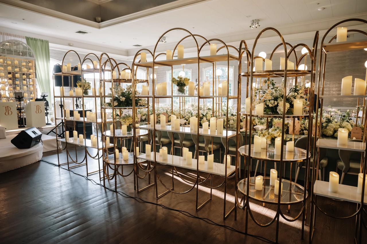 A wide view of the reception room with mirrors, white flowers and candlelight. Bar Mitzvah photography at Eagle Ridge, Lakewood, NJ.