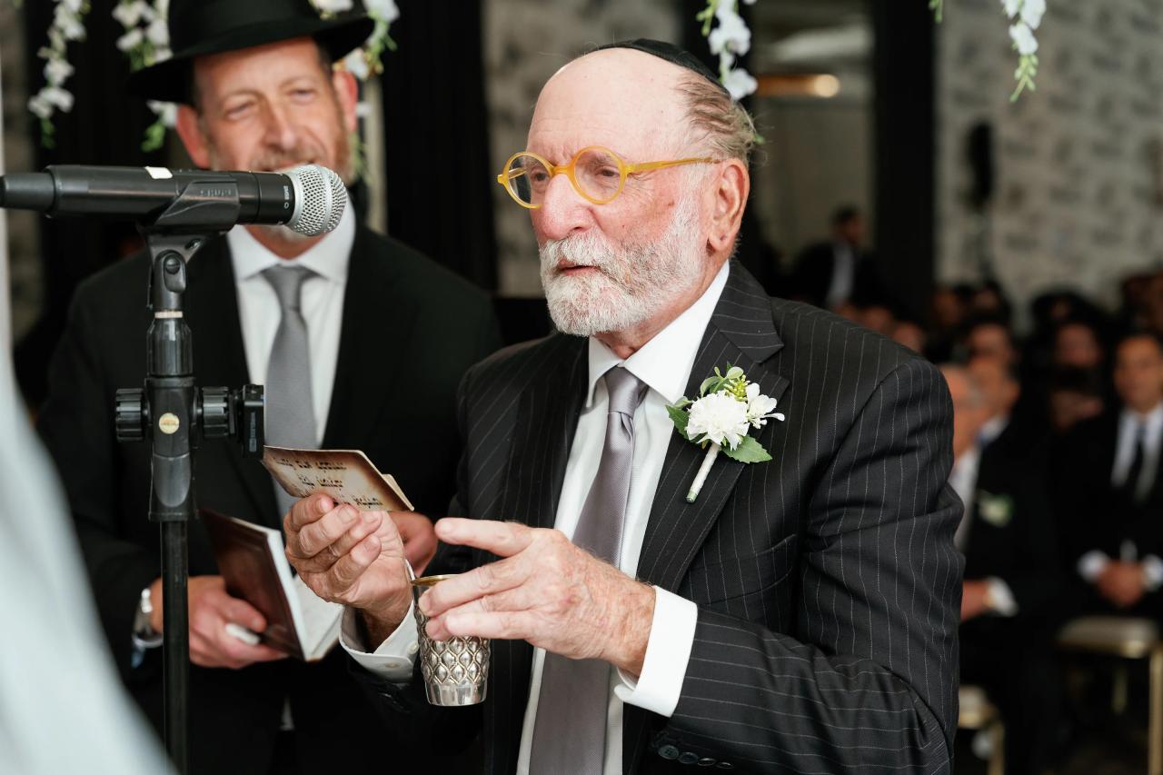 An emotional family reaction during the wedding ceremony. Wedding photography at Brightstone, Passaic, NJ.